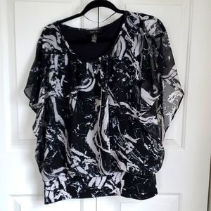 Contemporary black and white blouse